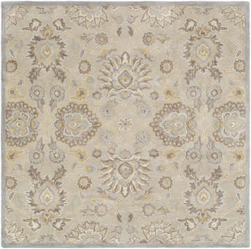 Close-up of the Conesus 1192 rug. Hand-tufted wool rug in ivory, taupe, and pale blue with a traditional floral pattern. Design-Square-6