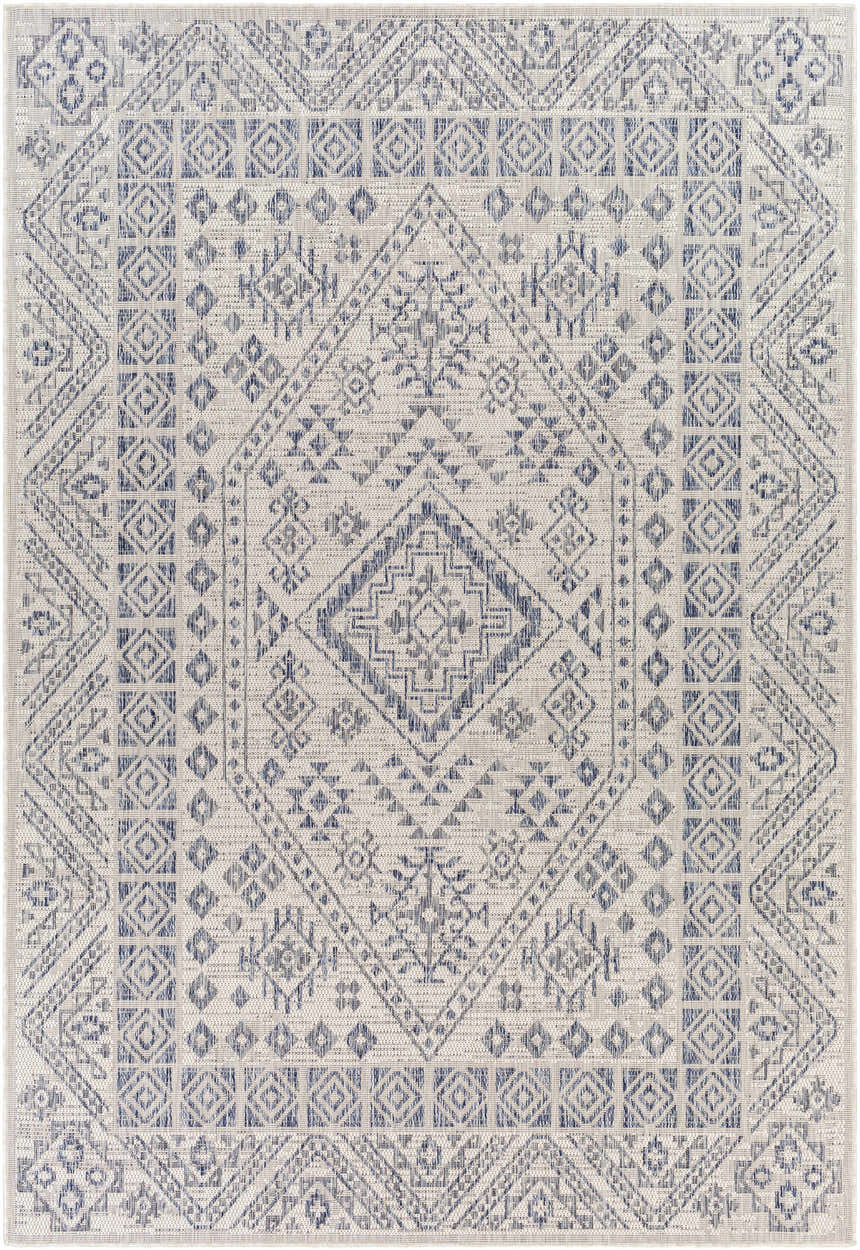 Close-up of the Balarim Indoor & Outdoor Rug. Features a gray and charcoal geometric, oriental-inspired pattern. Design-Rectangle-537