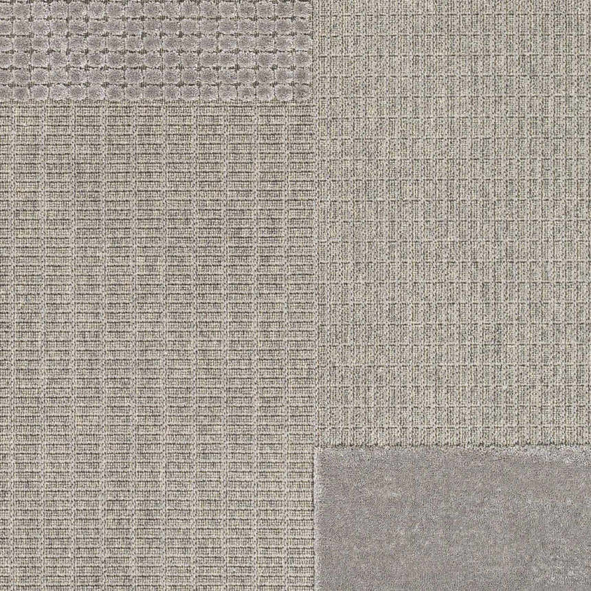 Close-up of the Bantiqui Area Rug showing a geometric pattern and textured viscose weave in neutral gray tones. Swatch