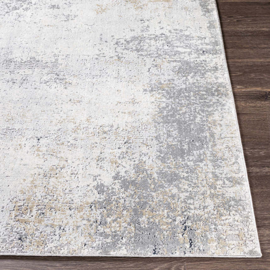 Close-up of the Baranduda Abstract Gray Luxe Rug showing charcoal, beige, and gray abstract pattern. Front