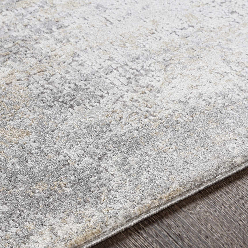 Close up of the Baranduda Abstract Gray Luxe Rug showing texture and pattern. Texture