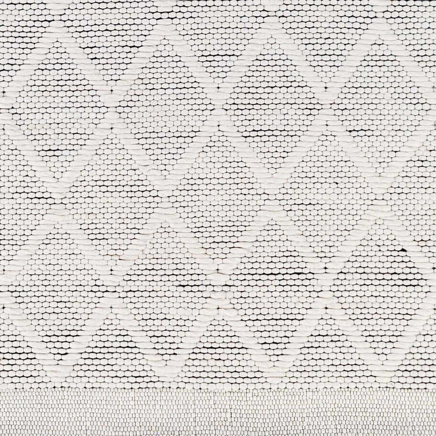 Close-up of the hand woven Bartimaeus Area Rug. Gray, nickel, and silverton rug with a diamond pattern and textured weave. Swatch