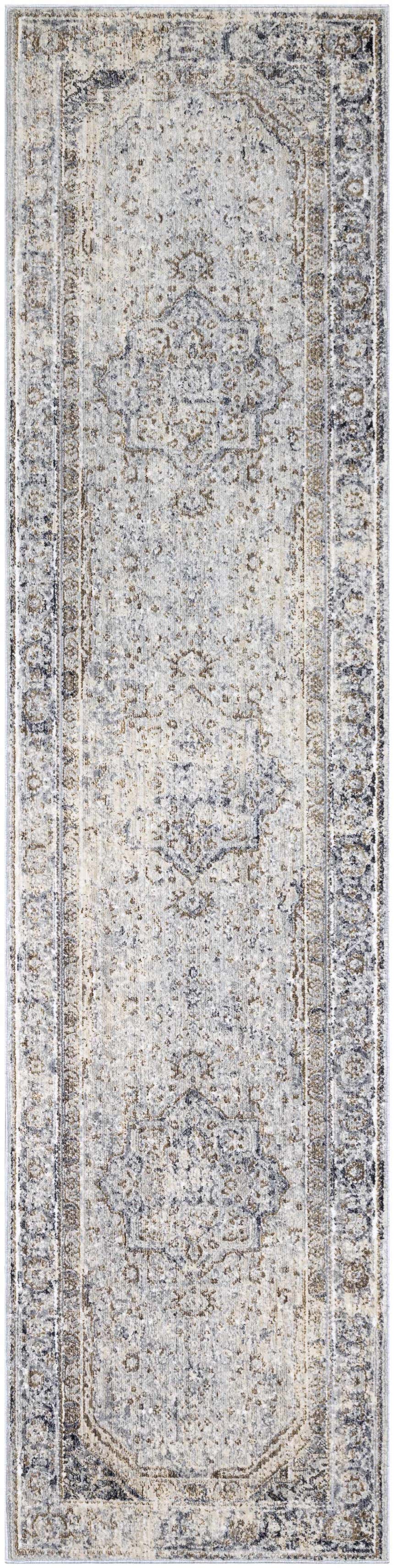 Close-up of the Beebe Luxe Machine Area Rug. Features a traditional, distressed design in ivory, gray, and brown tones. Design-Runner-2710