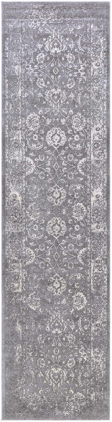 Close-up of a Benavides Gray Updated Traditional Tibetan Rug, showcasing its charcoal, gray, and ivory floral pattern and soft texture. Design-Runner-2710