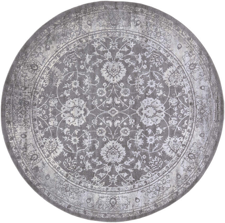 Close-up of a round Benavides Gray Updated Traditional Tibetan Rug with a floral pattern in charcoal, gray, and ivory. Design-Round-710