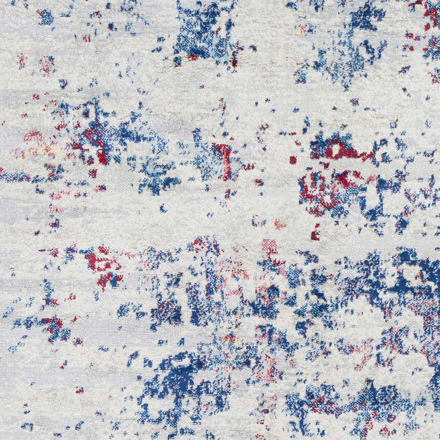 Close-up of the Bergvliet Area Rug. Abstract design in blue, burgundy, and cream on light gray polypropylene. Machine woven texture. Swatch