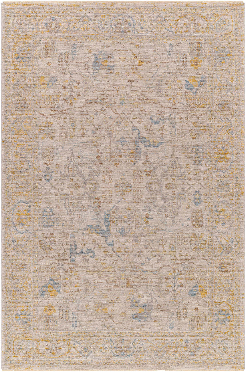 Close-up of Berta Thick Luxe Statement Rug in charcoal, brown, gray, mustard, tan, and taupe with a traditional floral pattern. Design-Rectangle-575