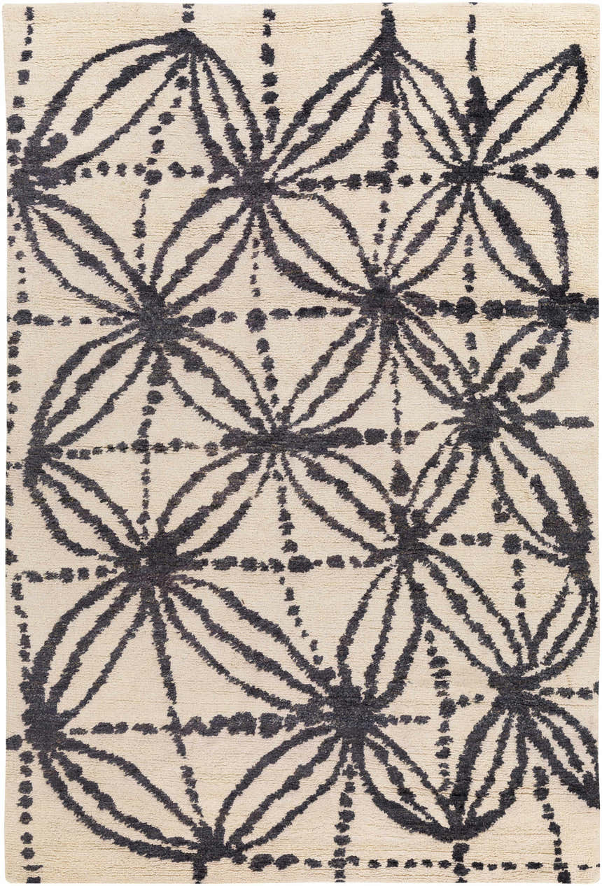 Close-up of Bonnyman Jute Carpet. Hand-woven rug with black floral pattern on ivory jute. Contemporary style. Design-Rectangle-576