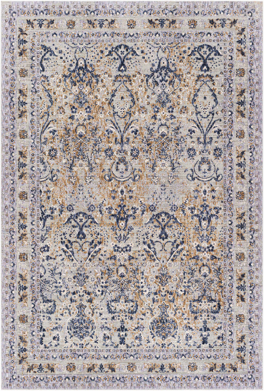 Close-up of the Barrie Area Carpet. Traditional rug with brown, charcoal, cream, and blue floral pattern on a light beige background. Design-Rectangle-5373