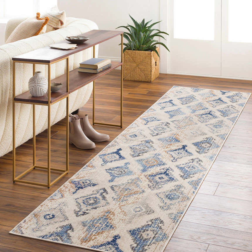 Entryway with Buckner Blue Ikat Rug runner, console table, and neutral decor. Bohemian style. Roomscene-Runner