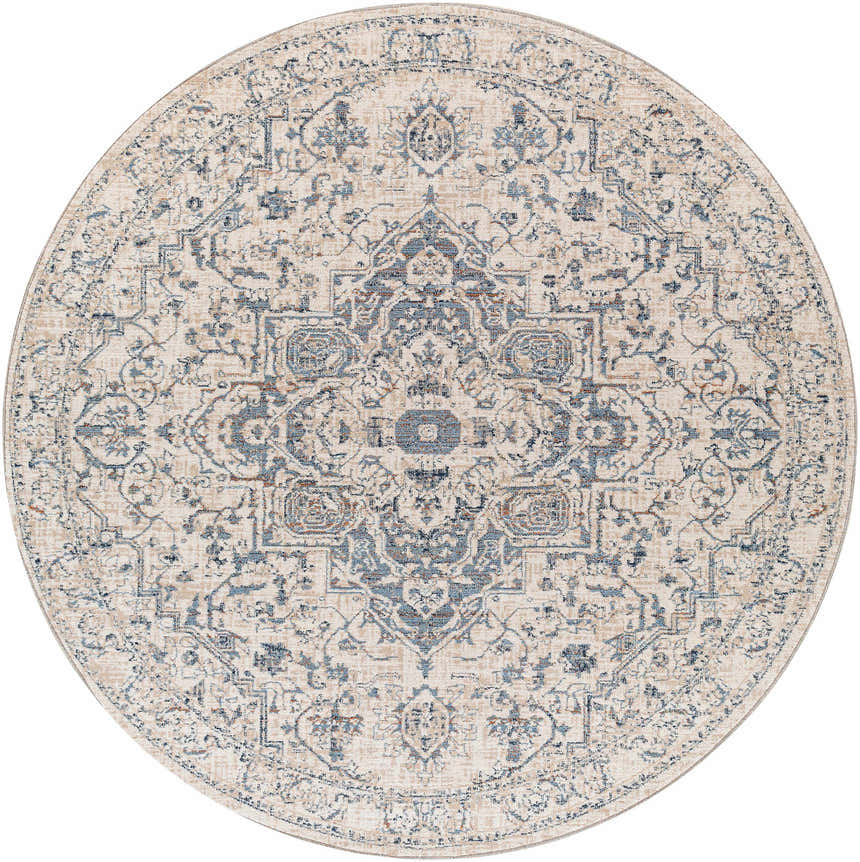 Close-up of the round Buguey Area Rug. Features a cream background with brick red and dark blue traditional patterns. Design-Round-710