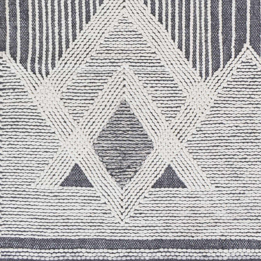 Close-up of Aldbourne Gray Tassel Flatweave Wool Rug featuring a geometric diamond pattern and woven texture. Swatch
