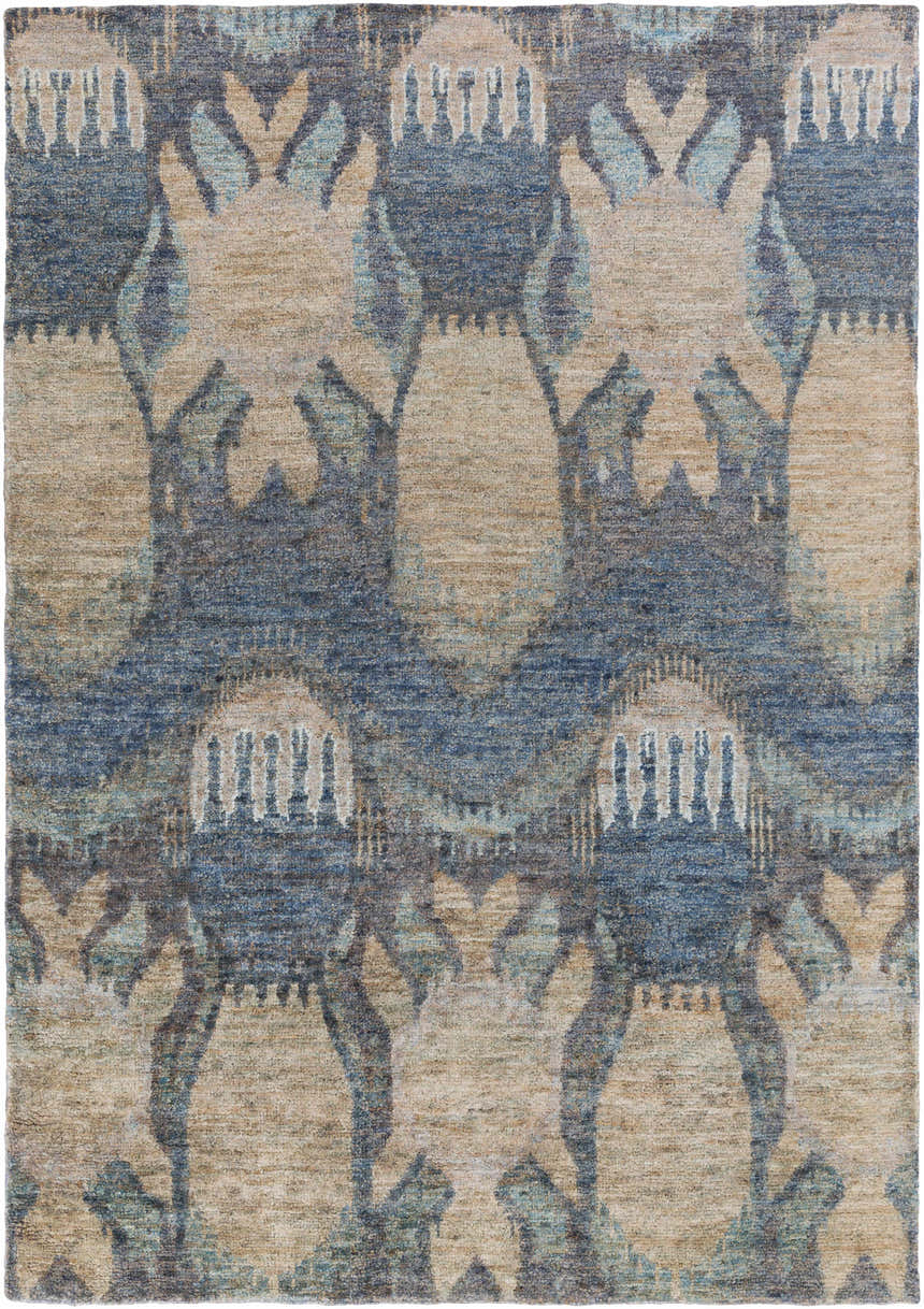 Close-up of the Bushong Jute Carpet. Southwestern style rug with blue, brown, and white colors. Hand knotted jute texture. Design-Rectangle-811