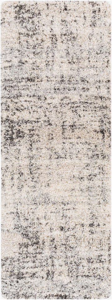 Close-up of the Calsib Area Rug. Shag rug in cream with black and light gray flecks, machine woven. Design-Runner-2773