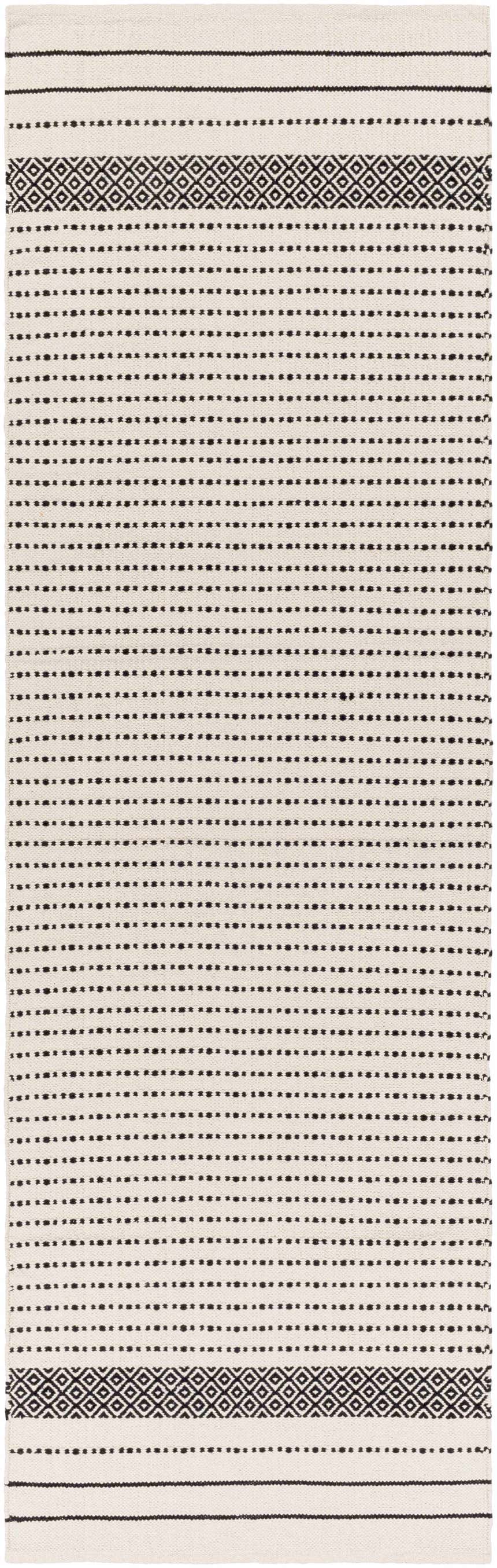 Close-up of Calumpang Area Carpet. Beige cotton rug with black stripes and Southwestern diamond pattern. Hand woven. Design-Runner-268