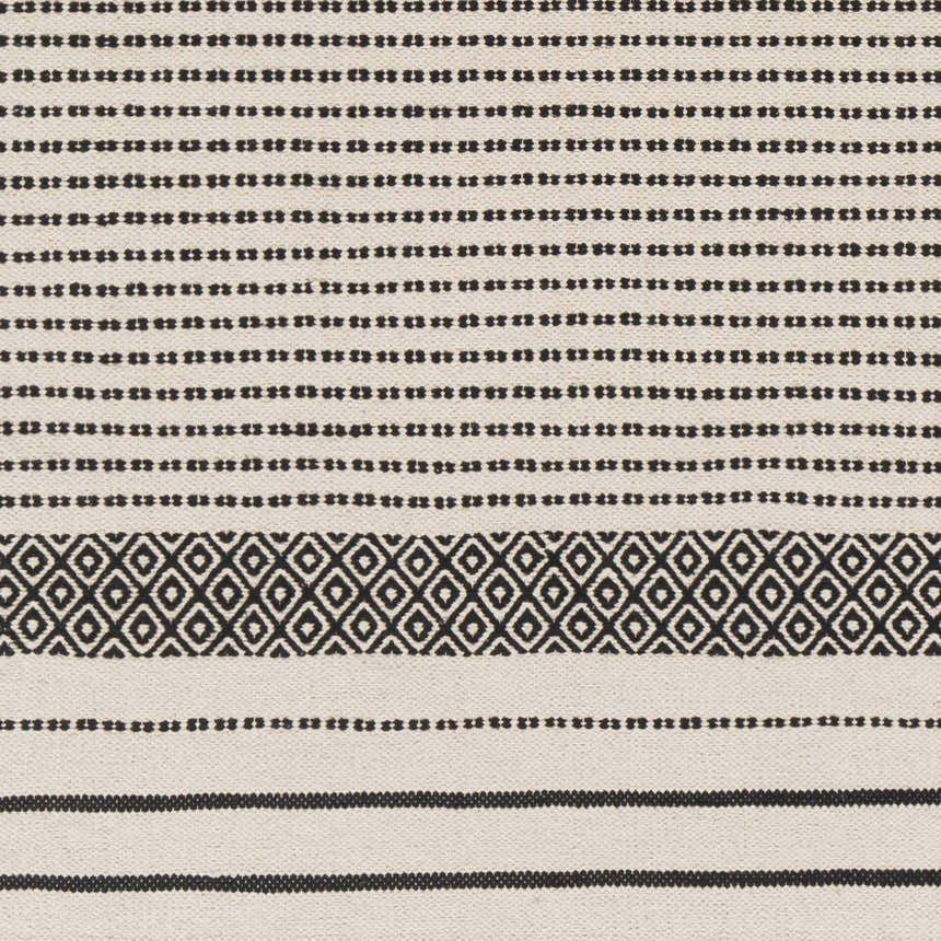 Close-up of the hand woven Calumpang Area Carpet, beige and black cotton with solid stripes and Southwestern diamond pattern. Swatch