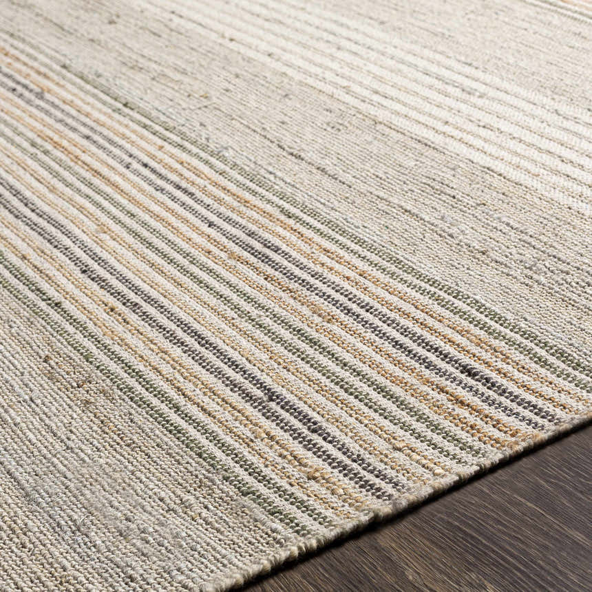 Close-up of the hand-woven Calinog Area Rug. Features stripes in charcoal, dark green, gray, light beige, and tan. Texture