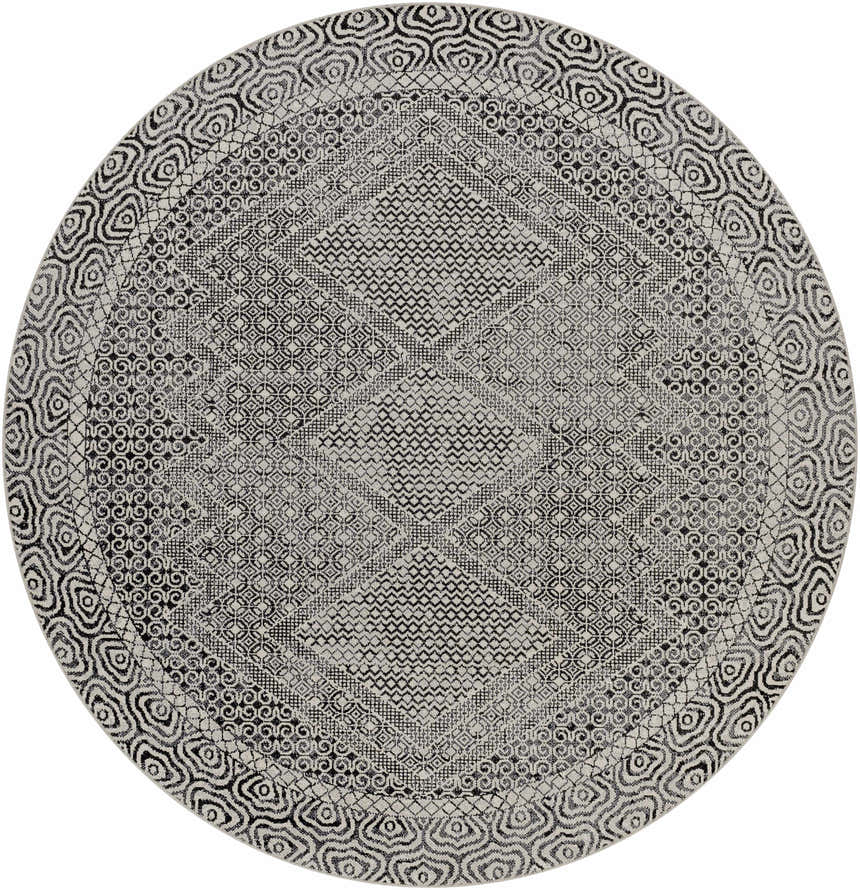 Close-up of round Coledale Black & White Washable Rug. Features a geometric, oriental-inspired pattern in black, gray, and light gray. Design-Round-67