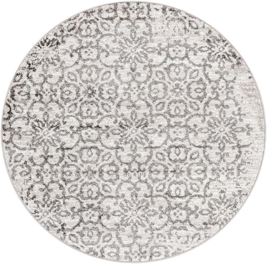 Close-up of round Cordele Area Rug. Charcoal and gray floral pattern on a white background. Farmhouse style. Design-Round-53