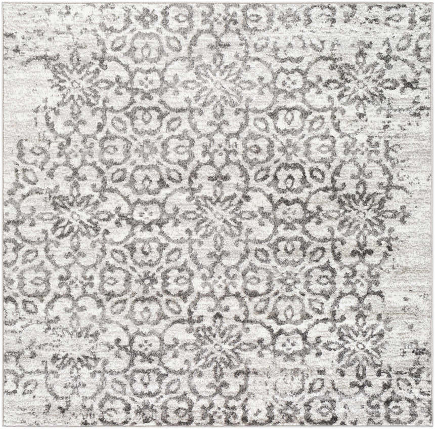 Close-up of the Cordele Area Rug. Features a traditional floral pattern in charcoal, gray, light gray, and white. Design-Square-53