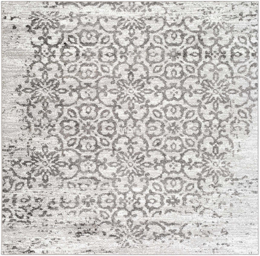 Close-up of the Cordele Area Rug - Clearance, featuring a traditional floral medallion pattern in charcoal, gray, and white. Design-Square-67