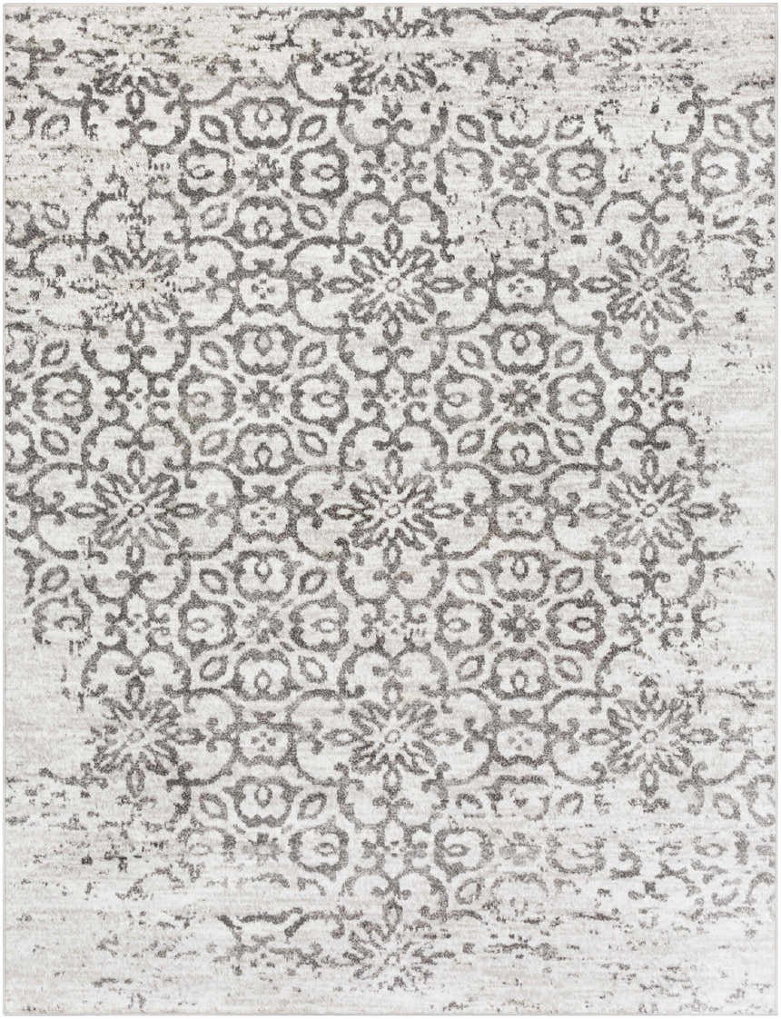 Close-up of the Cordele Area Rug. Gray floral medallion pattern on a white and charcoal distressed background. Design-Rectangle-710103