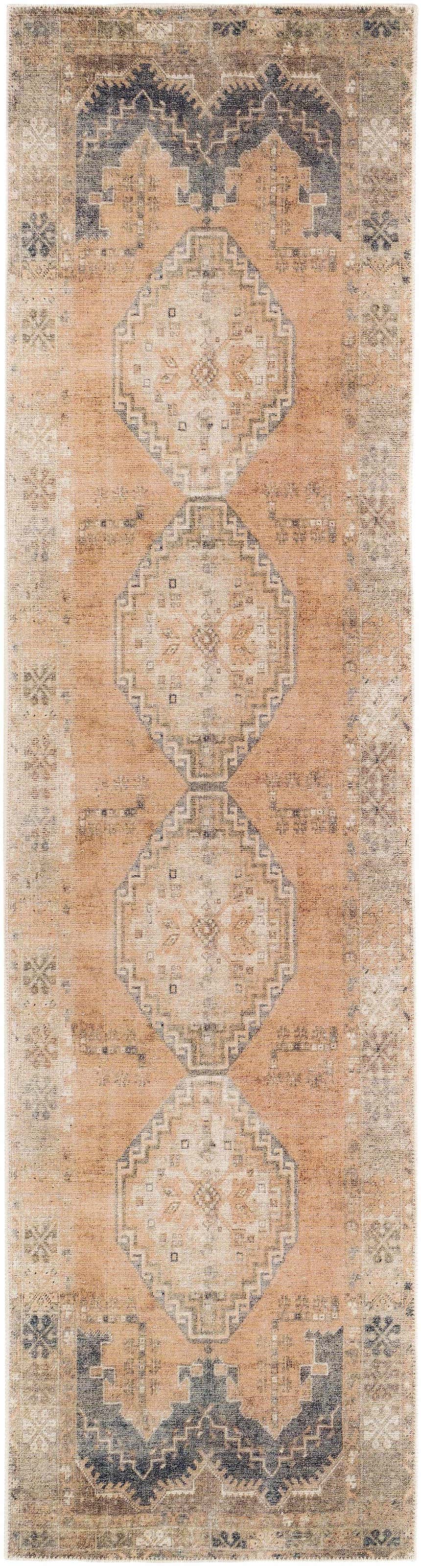 Close-up of a Carrabelle Peach Washable Area Rug runner with a traditional oriental pattern in peach, ivory, and navy. Design-Runner-2710