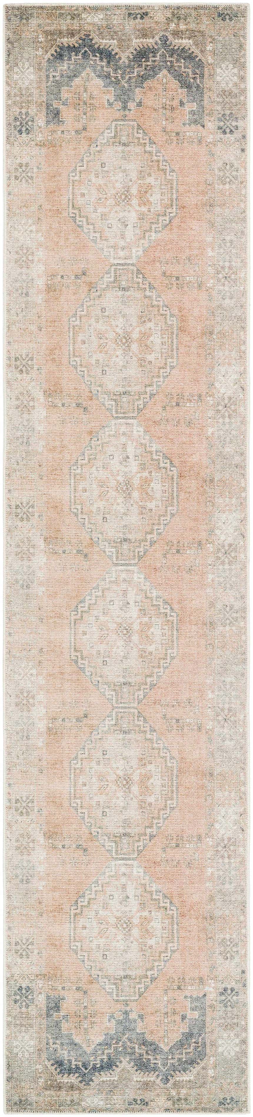 Close-up of the Carrabelle Peach Washable Area Rug, a traditional runner rug with peach, ivory, and navy geometric patterns. Design-Runner-2712