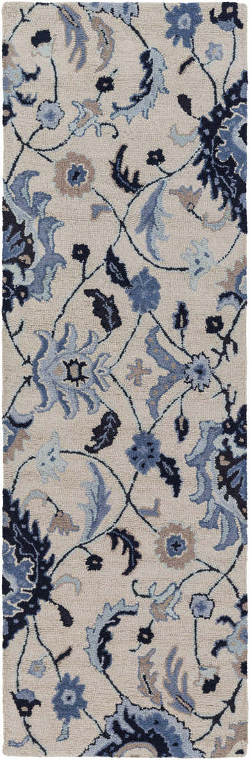 Close-up of the Cassadaga Area Carpet. Hand-tufted wool rug with beige background and dark blue, gray, and teal floral pattern. Design-Runner-268
