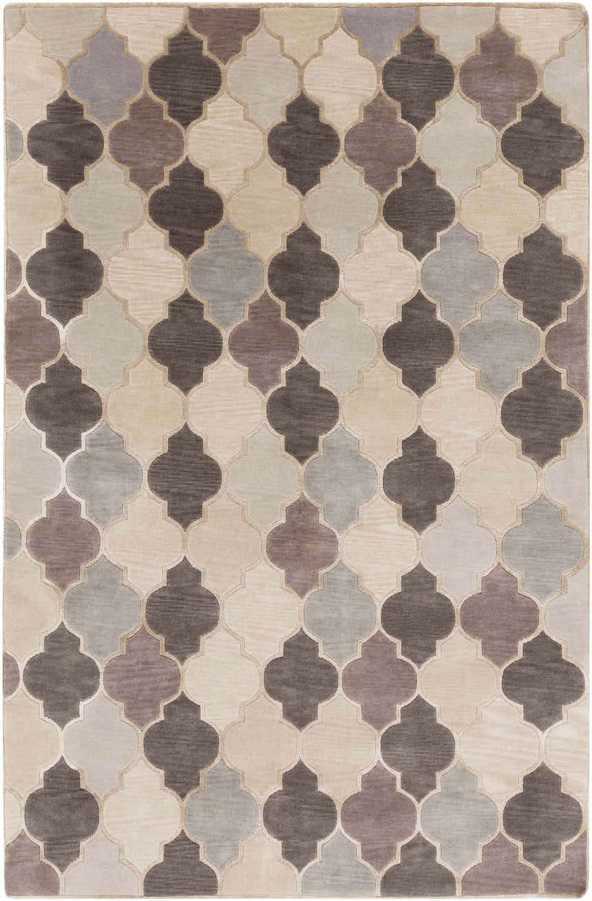 Close-up of the hand-knotted Cuero Area Rug. Features a quatrefoil pattern in charcoal, light brown, and taupe hues. Design-Rectangle-58