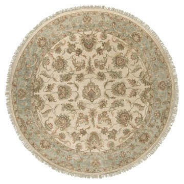 Round Dahlonega Area Carpet in beige, light sage, and brown. Hand-knotted wool rug with traditional floral pattern and fringe. Design-Round