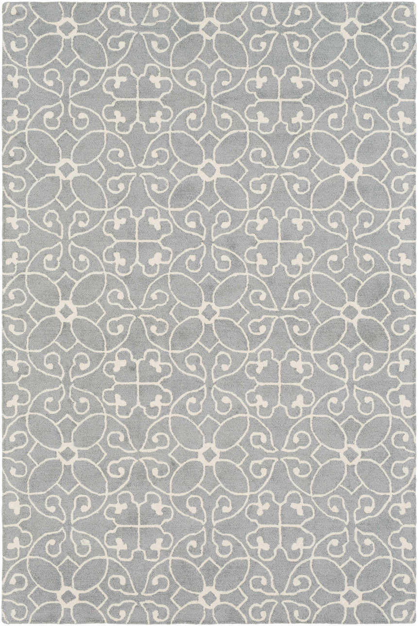 Close-up of the Davie Area Rug. Hand-tufted wool rug in slate blue with an ivory farmhouse-style pattern. Design-Rectangle-576