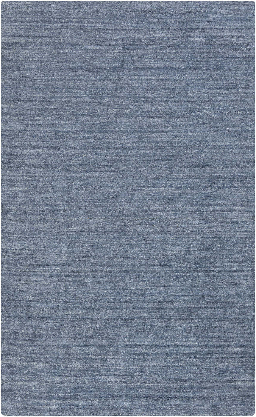 Close-up of the Davy Viscose Area Rug. Hand-loomed, blue rug with a subtle striped pattern and soft, textured viscose. Design-Rectangle-58