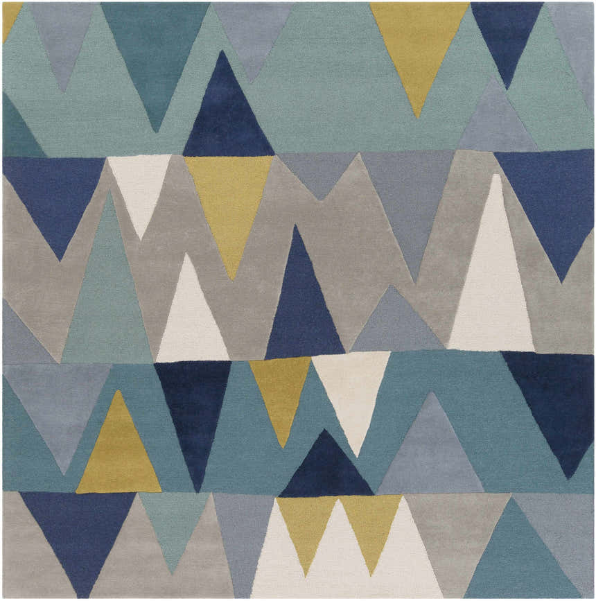 Close-up of the Deatsville Wool Area Rug. Features a geometric pattern with blue, gray, navy, tan, and teal triangles. Hand-tufted texture. Design-Square-8