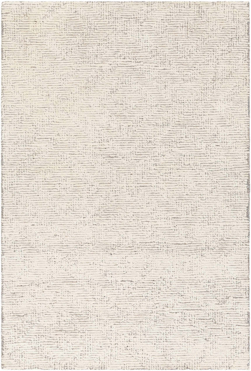 Close-up of the Delahey Area Rug. Hand-tufted, cream-colored wool rug with a subtle charcoal pattern. Contemporary style. Design-Rectangle-576