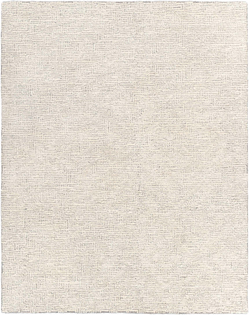 Close-up of the Delahey Area Rug. Hand-tufted, cream and charcoal wool rug with a subtle geometric pattern. Design-Rectangle-810