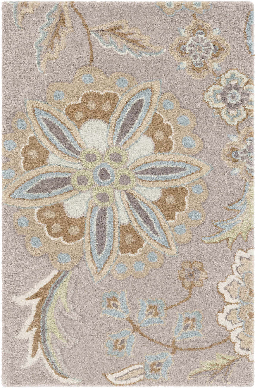 Close-up of the Denio Area Rug. Hand-tufted wool rug with floral design in brown, sage, taupe, and sky blue. Design-Rectangle-23