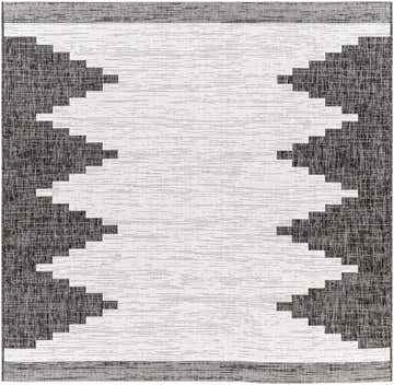 Close-up of the Djugun Outdoor Rug, showcasing its black, charcoal, and off-white Southwestern-inspired geometric pattern. Design-Square-67