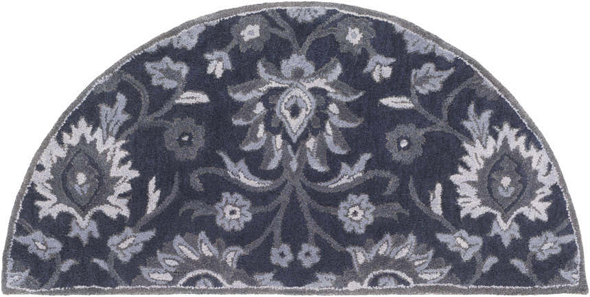 Close-up of the Conesus Hand Tufted Blue Area Rug. Hearth shape with charcoal, denim, and slate blue floral pattern. Design-Hearth