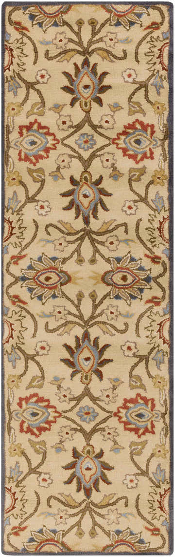 Close-up of the Caesar 1116 rug. Hand-tufted wool rug in beige with rust, blue, and brown floral and vine pattern. Design-Runner-268
