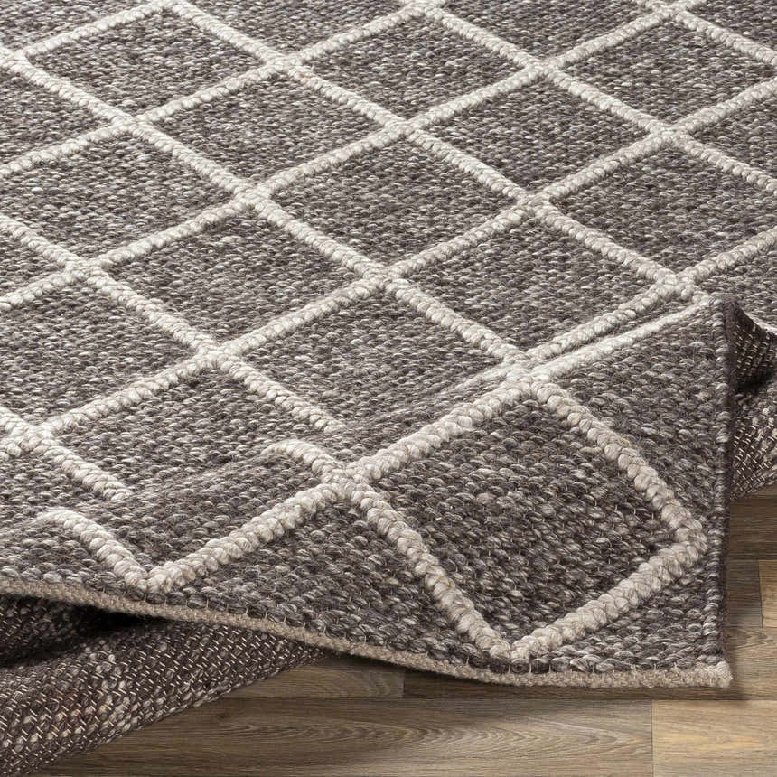 Close-up of the hand woven Syosset 2x3 Brown Trellis Wool & Viscose Rug showing texture and diamond pattern. Fold