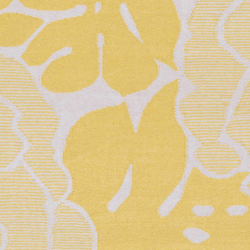 Close-up of the Falmouth Area Rug. Light gray and mustard wool with a contemporary leaf pattern and hand woven texture. Swatch
