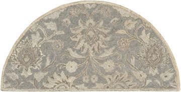Close-up of the Conesus 1195 rug. Hand-tufted wool rug in a hearth shape with ivory and taupe floral pattern. Design-Hearth