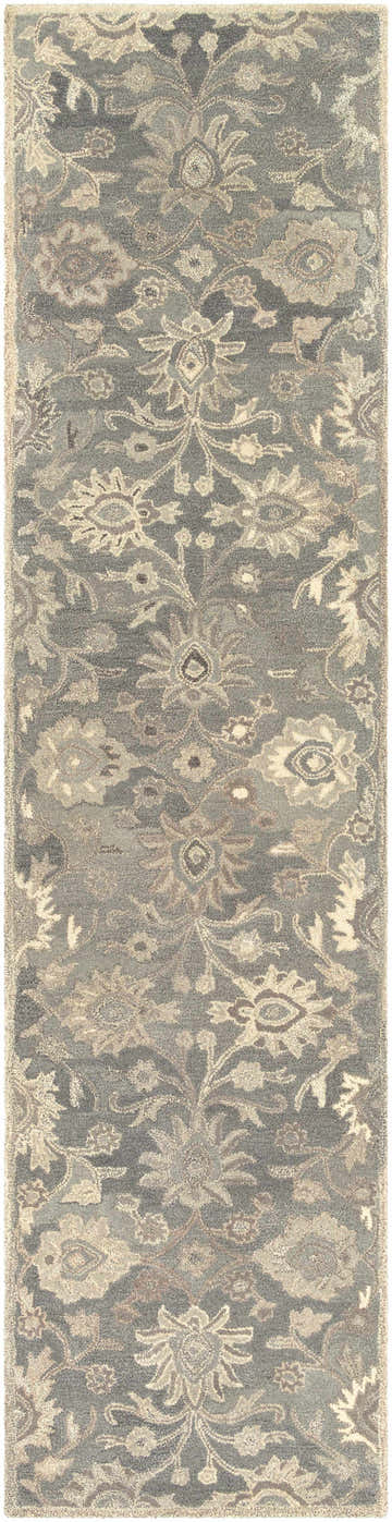 Close-up of the Conesus 1195 rug. Hand-tufted wool rug in ivory and taupe with a traditional floral pattern. Design-Runner-312