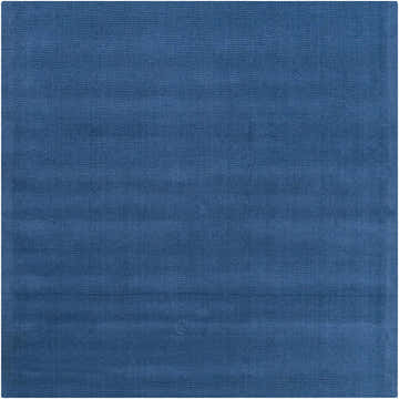 Close-up of the Brockton Solid Blue Wool Rug. Hand-loomed, dark blue rug with a subtle striped texture. Design-Square-8