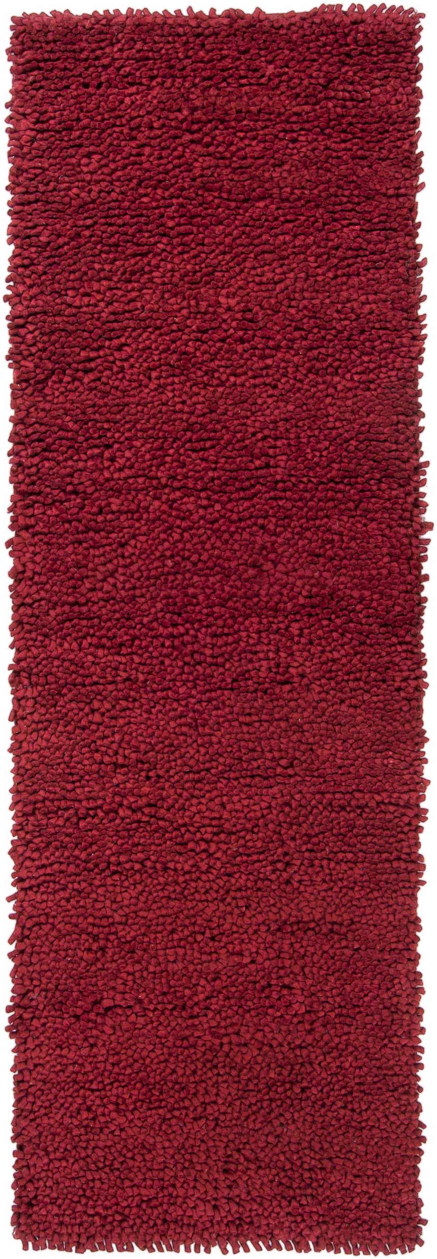 Close-up of a Frederika Solid Dark Red Wool Shag Rug showing the texture and color. Clearance item. Design-Runner-268