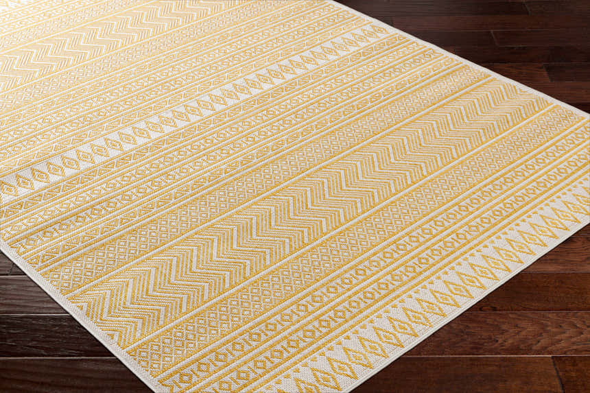 Close-up of Galal Area Rug; beige and gold geometric pattern on a machine woven, 100% Polypropylene rug. Corner