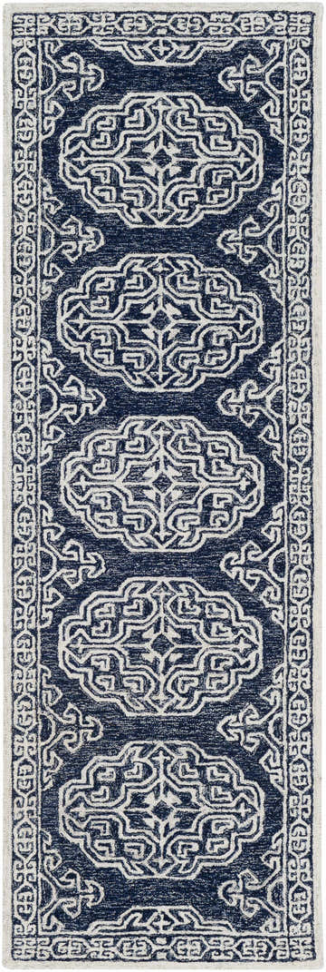 Close-up of the Glenoma Blue Regency Wool Rug, showcasing its navy and beige bohemian-style pattern and hand-tufted texture. Design-Runner-268