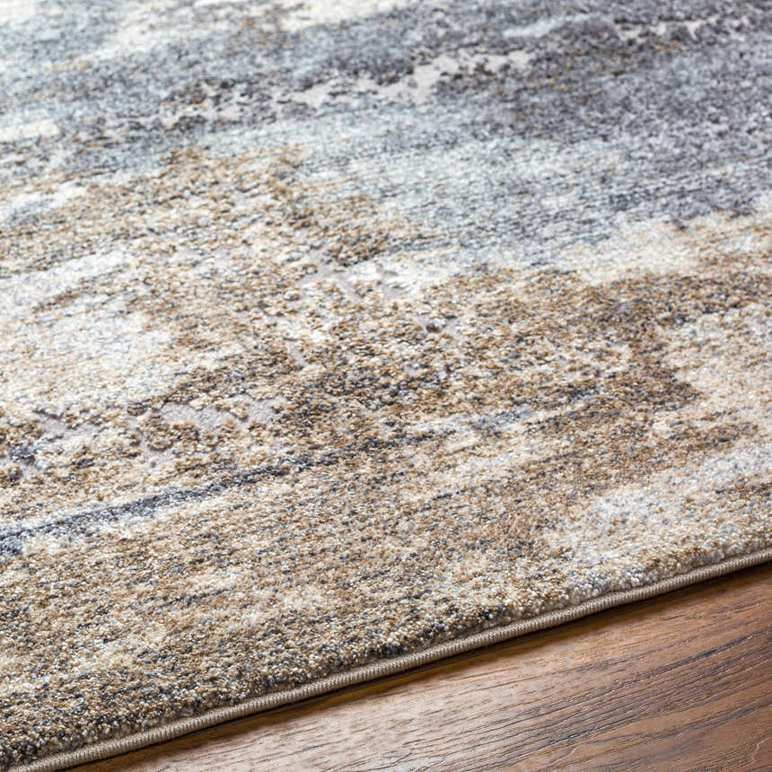Close-up of Gonen Thick Luxe Rug showing its brown, gray, and white contemporary pattern and plush texture. Texture