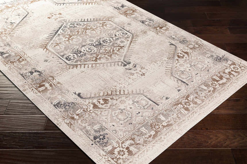 Close-up of Hainesville White Medallion 10' Runner Rug on dark wood floor. Farmhouse style with neutral tones and traditional medallion pattern. Corner